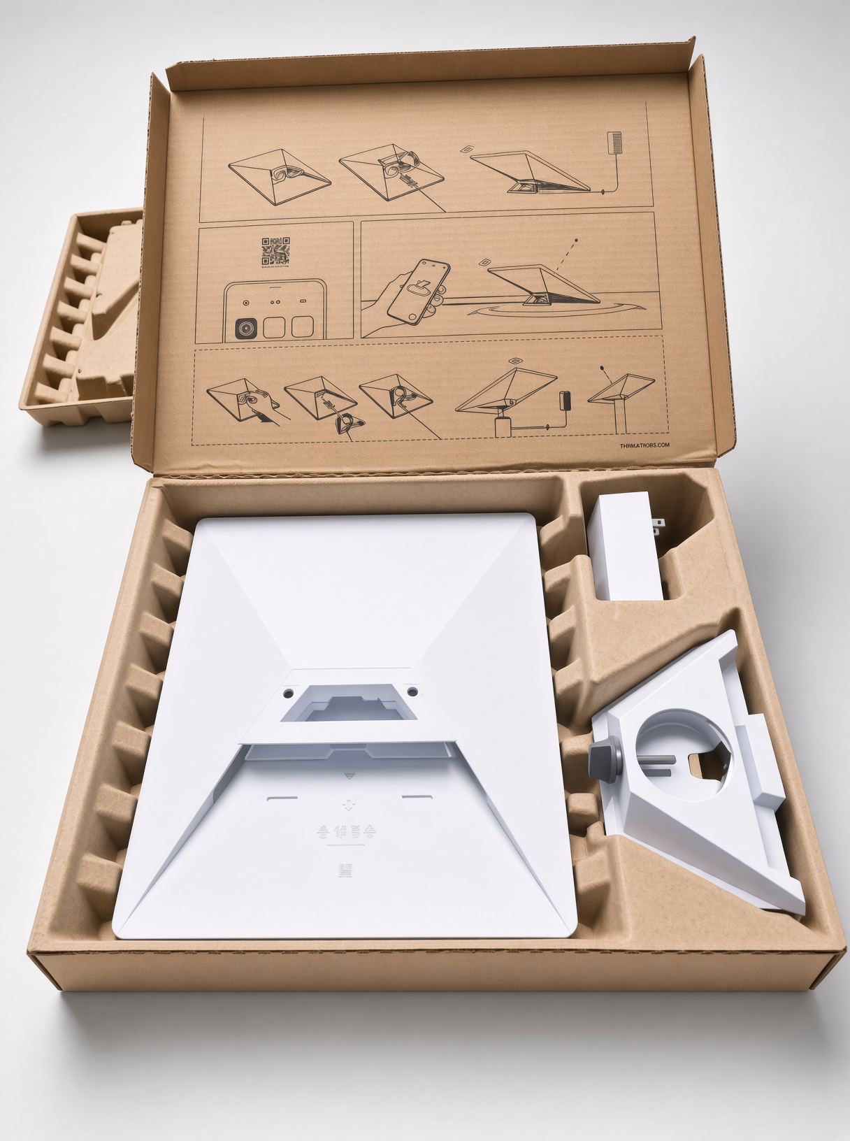 Caja abierta del kit Starlink con la antena, el soporte y la fuente